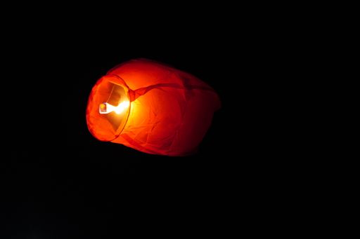 A beautiful view of lanterns floating in the night sky