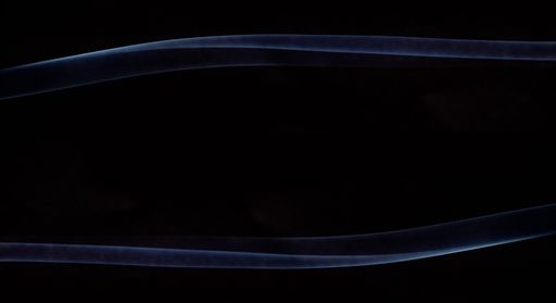 The abstract waves made of a soft fabric isolated on a black background