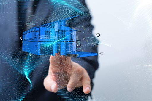 A real estate agent working on a digital render of a blue house design
