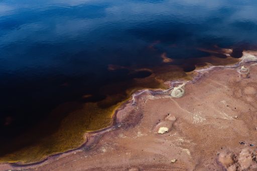 A high angle shot of a small natural pond at the Rio Tinto mining park in Spain