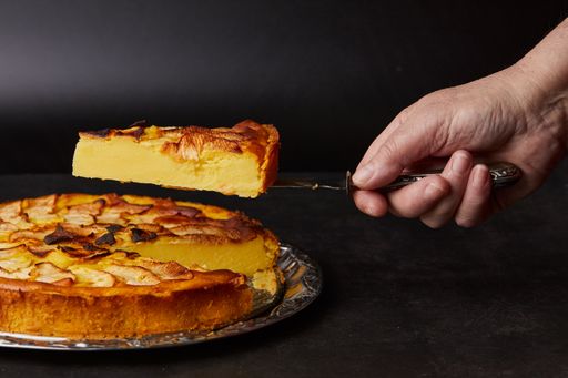 A closeup of a slice of apple cake