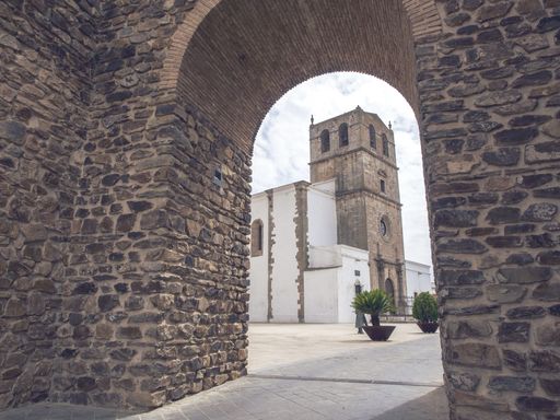 A low angle shot of the facade of an ancient building