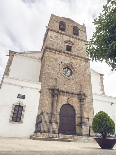 A low angle shot of the facade of an ancient building