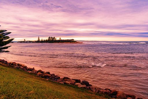 A beautiful beach during the purple sunset