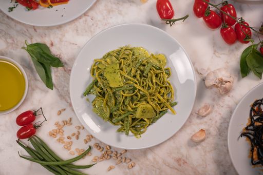 A closeup shot of Fresh tagliolini pesto on a plate