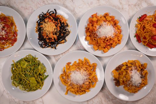 A top view shot of a collection of various pasta dishes