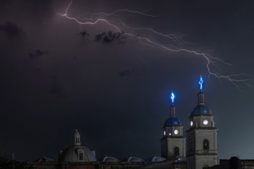 A night shot of the temple of San Juan Bautista with thunder, Tuxpan, Jalisco