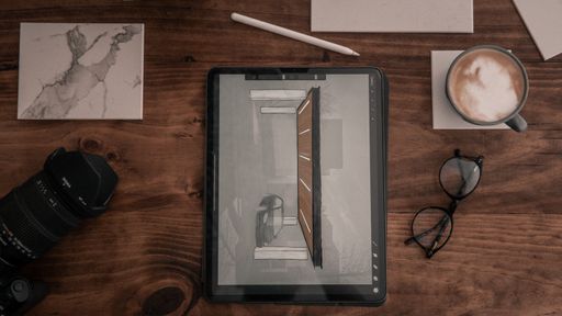 A desk with multiple objects on it