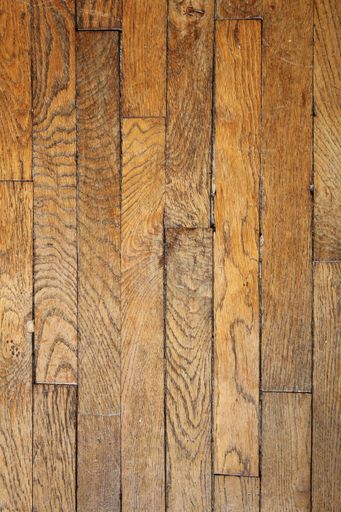 A vertical high angle shot of a parquet floor under the lights - interior concept