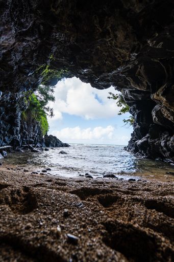 A vertical shot of the rocky Turtle Cove in North Shore, Kauai, Hawaii