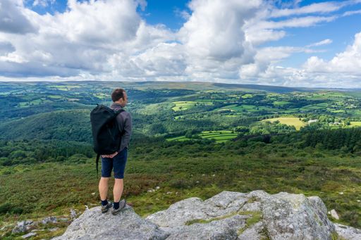 A walker on Buckland Beacon, Dartmoor National Park, Devon