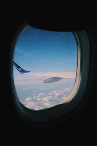 The beautiful view of cloudy skies from an airplane's window