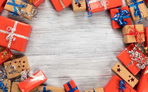 A top view shot of frame with presents and copy space