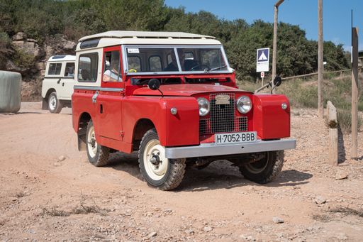 The Red Land Rover Santana Series II in the field