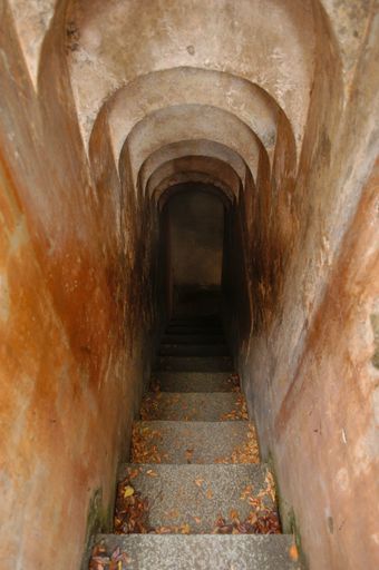 A shot of an old, weathered and creepy underground tunnel