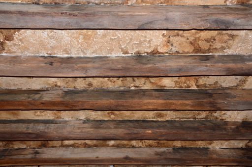 The ceiling of an old  building damaged by water leakage