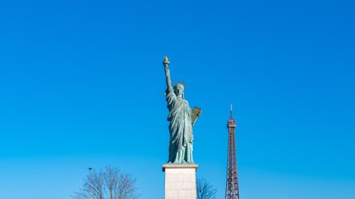 Paris, the liberty statue on the Seine, and the Eiffel Tower in background