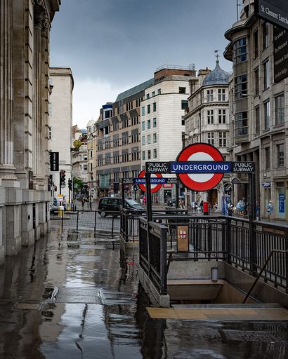 The buildings and the underground signs on a rainy day in London