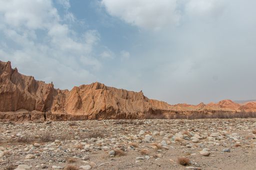 A beautiful shot of orange sandstone formations on a cloudy day in Western China