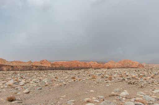 A beautiful shot of orange sandstone formations on a cloudy day in Western China