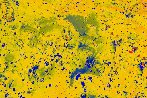 A colorful wallpaper pattern created with different paints