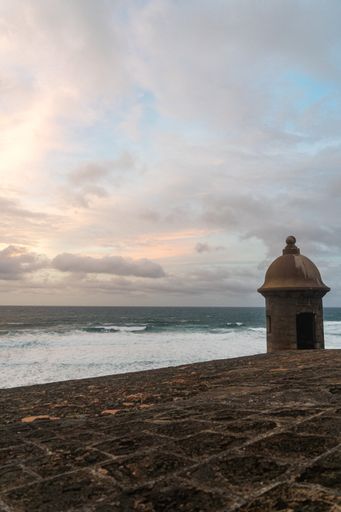 A beautiful view of the wavy sea and cloudy sky from Castillo San Cristobal in San Juan, Puerto Rico