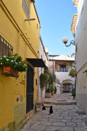 A small street in the historic center of Venosa, an old town in the Basilicata region.