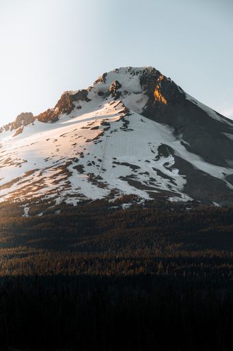 A beautiful view of mountains under the blue sky on a sunny day