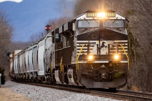 A closeup of a moving Norfolk Southern cargo train in the Shenandoah Valley