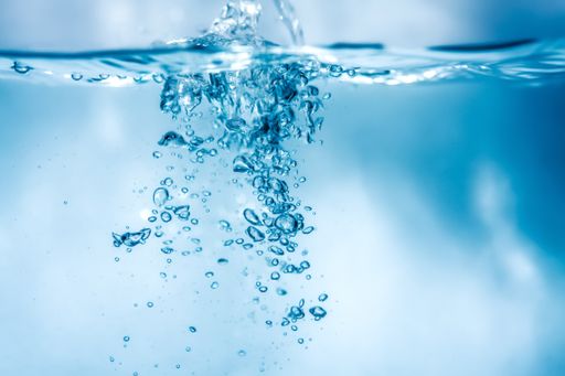 A closeup of air bubbles in a water, perfect for wallpaper or  background