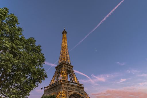 A beautiful shot of Eiffel Tower, Paris under the blue sky