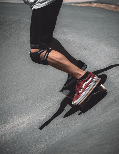 A vertical shot of a skateboarder performing stunt