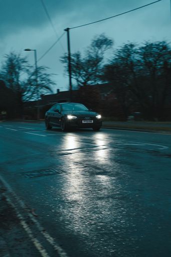 An Audi A6 in the rainy weather