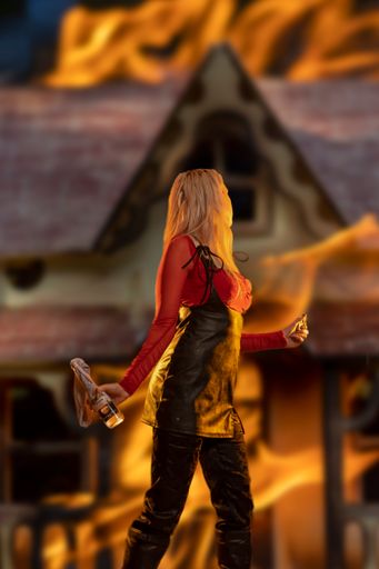 A mystical portrait of a caucasian female against the background of fire
