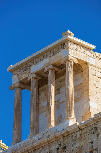 A vertical shot of the ancient Acropolis of Athens located in Athens Greece