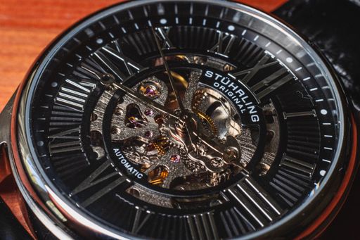 A product style shot of a Stuhrling skeleton dress watch