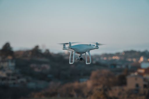 A big white drone in hovering