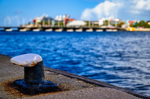 A view of a bridge in willemstad on curacao with blue sky and beautiful clouds