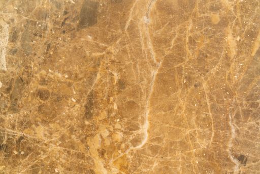 A closeup of the texture of stone marble with striped streaks
