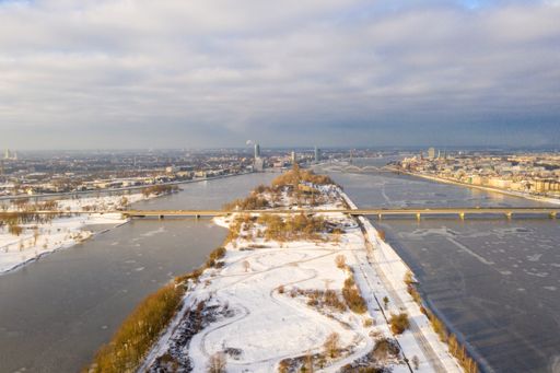 The aerial view of the Daugava river and buildings in Riga, Latvia in winter