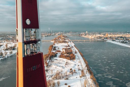 The aerial view of the Daugava river and buildings in Riga, Latvia in winter