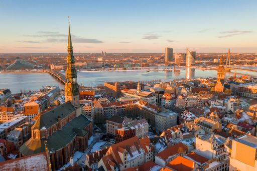 The aerial view of the old buildings in Riga, Latvia during sunset