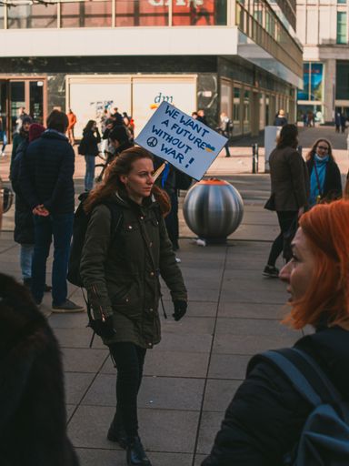 A closeup of people Protesting in Berlin against the war in Ukraine