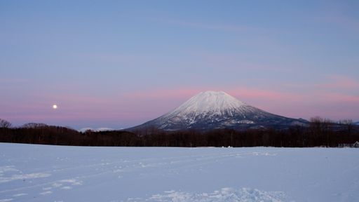 A scenic view of Mount Yotei in Shikotsu-Toya National Park, Hokkaido, Japan during sunset