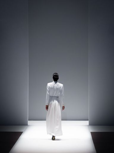 Model walking a catwalk during a fashion show