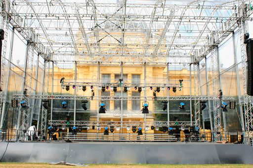 The Stage in day light for the concert and building in the background