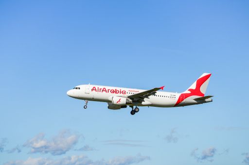 An Air Arabia Airbus A320 plane landing at Josep Tarradellas Barcelona-El Prat airport
