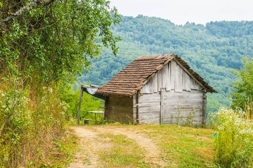 A closeup of an old Abandoned log cabin on a mountain in Serbia
