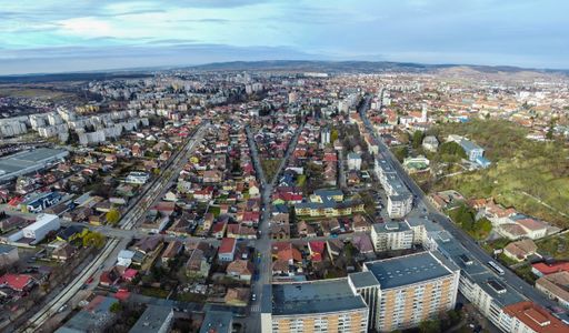 An aerial view of the city of Targu Mures in Romania under the bright sunlight