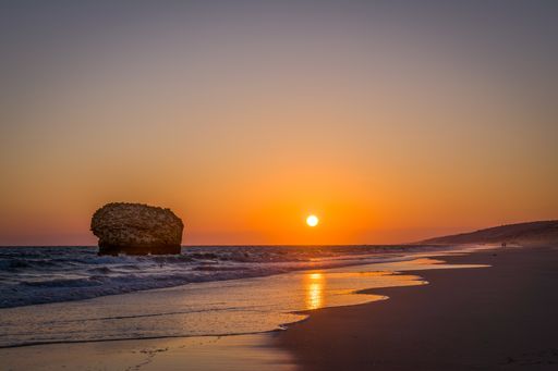 Sunset on the beach in Matalascanas, Huelva. In the background, you can see the Torre de la Higuera.